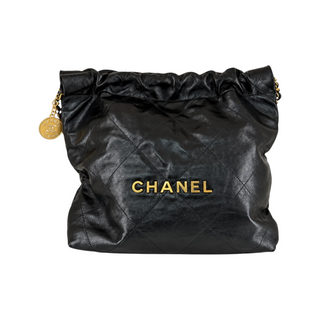 Chanel Black Quilted Calfskin Leather CHANEL Logo Drawstring Shoulder Bag with Gold Hardware