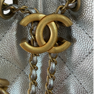 Chanel Silver Metallic Quilted Drawstring Tote Bag