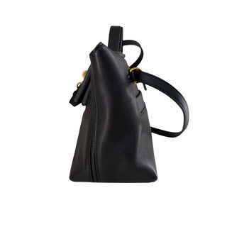 Hermès 24/24 Black Leather Bag With Gold-Tone Hardware.