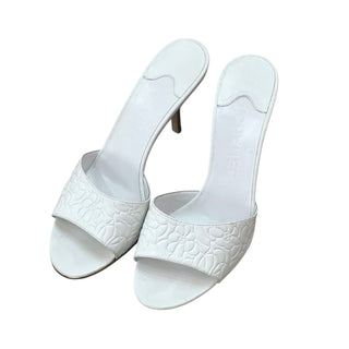 Chanel White Camellia Embossed Leather Mules